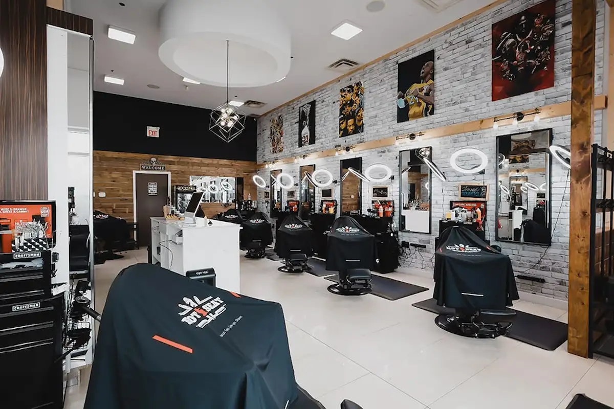 Clean barbershop interior where men get regular haircuts to maintain their style