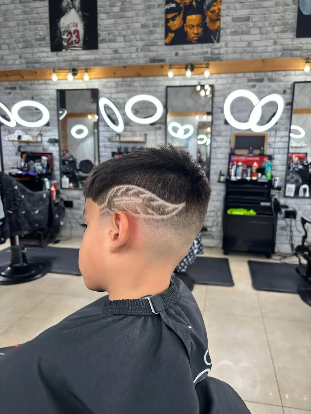 Modern, tapered mullet haircut on a teenage boy