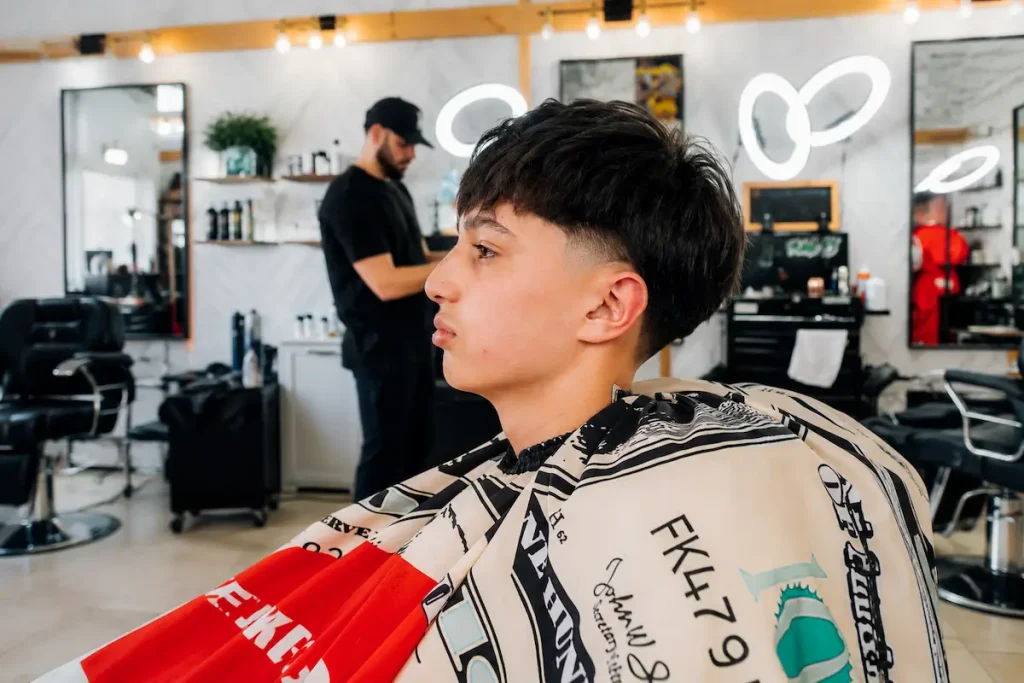 Textured kids fade haircut at a modern Richmond Hill barbershop
