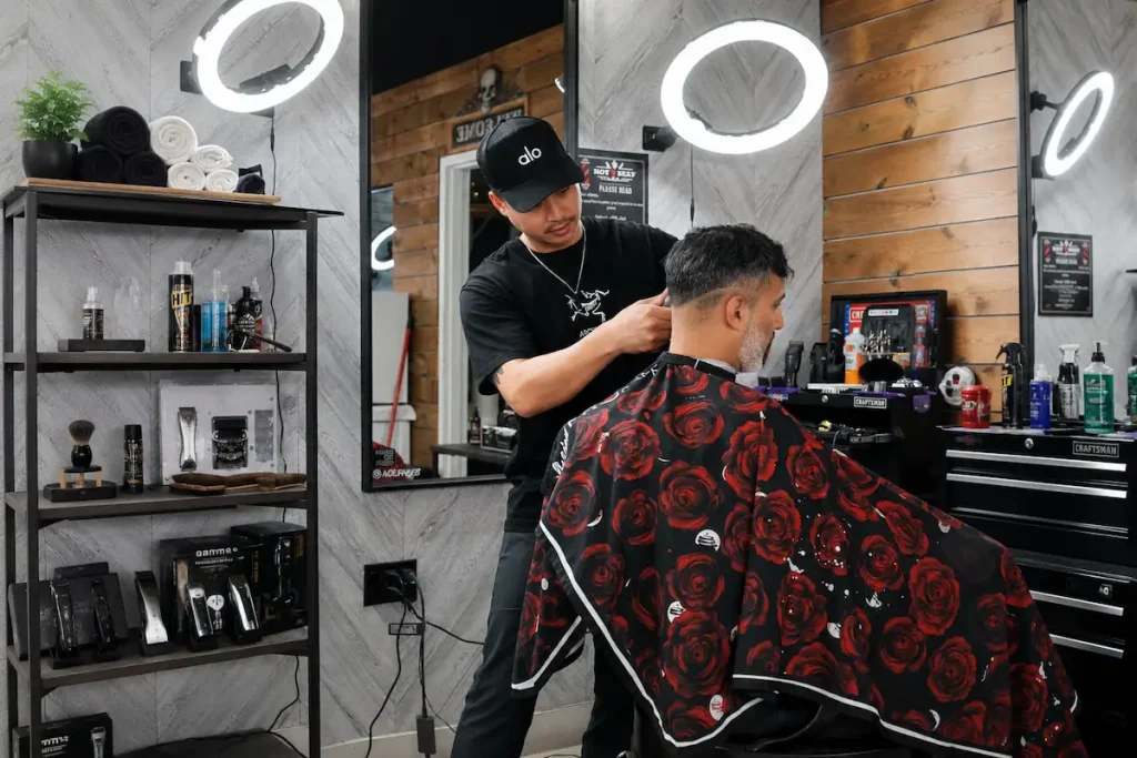 Barber creating a summer fade haircut for a client in Richmond Hill